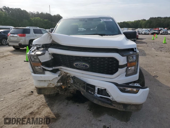 2023 Ford F-150 XL with VIN 1FTEX1EP8PKF69707, listed as a Copart auction lot 53138065 with 18,816 mi miles and Salvage title. Bid and sale history available at DreamBid. Image 5.