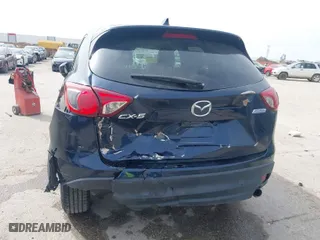 2015 Mazda CX-5 Touring with VIN JM3KE2CY7F0454754, listed as a IAAI auction lot 41734991 with 110,947 mi miles. Bid and sale history available at carsss.com. Image 6.