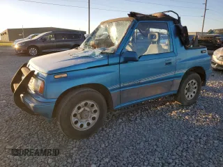 1992 Suzuki Sidekick z VIN 2S3TC01C2N6405497, wystawiony jako Copart lot #75856164 z przebiegiem 38 423 mil mil oraz Szkody całkowita. Historia ofert i sprzedaży dostępna na DreamBid. Obrazek 1.