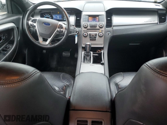 2016 Ford Taurus SEL z VIN 1FAHP2E87GG146931, wystawiony jako Copart lot #56135655 z przebiegiem 99 733 mil mil oraz Szkoda całkowita • Salvage title. Historia ofert i sprzedaży dostępna na DreamBid. Obrazek 8.