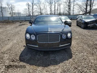 2014 Bentley Flying Spur with VIN SCBEC9ZA7EC095064, listed as a Copart auction lot 52218105 with 24,143 mi miles and Salvage title. Bid and sale history available at DreamBid. Image 5.