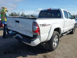 2015 Toyota Tacoma PreRunner with VIN 3TMKU4HN6FM044238, listed as a IAAI auction lot 41534623 with 196,490 mi miles and . Bid and sale history available at DreamBid. Image 4.