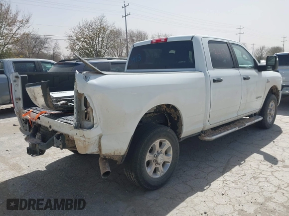 2023 Ram 2500 Big Horn with VIN 3C6UR5DL0PG544133, listed as a IAAI auction lot 41683879 with 57,265 mi miles and . Bid and sale history available at DreamBid. Image 4.