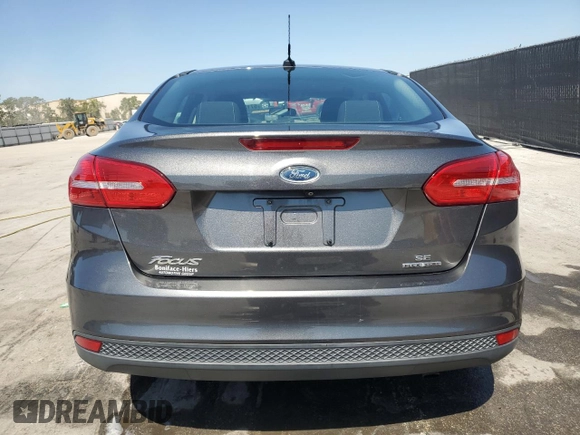 2016 Ford Focus SE with VIN 1FADP3F20GL250053, listed as a Copart auction lot 57134955 with 120,261 mi miles and Salvage title. Bid and sale history available at DreamBid. Image 6.