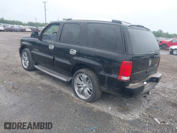 2003 Cadillac Escalade z VIN 1GYEK63N13R140496, wystawiony jako IAAI lot #42366303 z przebiegiem 90 940 mil mil oraz . Historia ofert i sprzedaży dostępna na DreamBid. Obrazek 3.