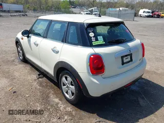 2015 MINI Hardtop 4 Door with VIN WMWXS5C53FT832742, listed as a IAAI auction lot 42059417 with 114,671 mi miles and . Bid and sale history available at DreamBid. Image 3.
