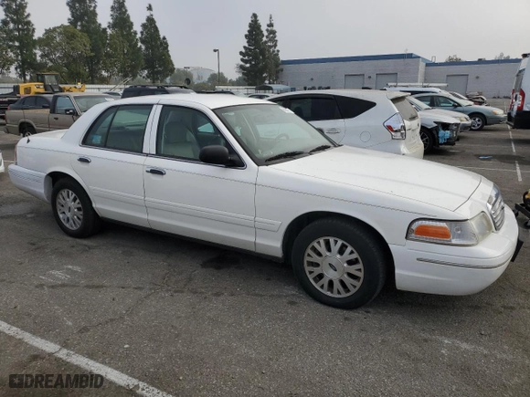2005 Ford Crown Victoria LX with VIN 2FAFP74W95X124697, listed as a Copart auction lot 86931404 with 303,132 mi miles and Clean Title. Bid and sale history available at carsss.com. Image 4.