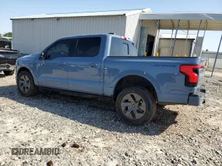 2023 Ford F-150 Lightning Pro с VIN 1FT6W1EV1PWG53186, выставлен на аукционе Copart как лот 52423485 с пробегом 23 518 миль миль и Списание • Salvage title. История ставок и продаж доступна на DreamBid. Изображение 2.