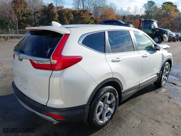 2018 Honda CR-V EX-L with VIN 2HKRW1H85JH504019, listed as a IAAI auction lot 40179782 with 33,878 mi miles. Bid and sale history available at carsss.com. Image 4.