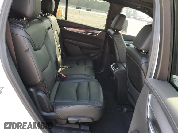 2024 Cadillac XT6 FWD Luxury with VIN 1GYKPAR47RZ705252, listed as a Copart auction lot 49244015 with 26,838 mi miles and Salvage title. Bid and sale history available at DreamBid. Image 11.
