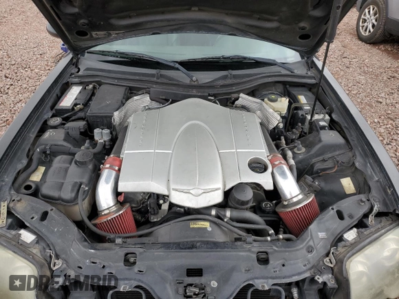 2004 Chrysler Crossfire z VIN 1C3AN69LX4X023972, wystawiony jako Copart lot #49111475 z przebiegiem 208 710 mil mil oraz Szkoda całkowita • Salvage title. Historia ofert i sprzedaży dostępna na DreamBid. Obrazek 11.