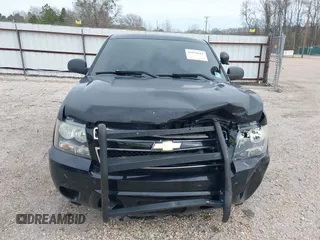 2011 Chevrolet Tahoe Commercial with VIN 1GNLC2E01BR289534, listed as a IAAI auction lot 41670183 with 119,422 mi miles and . Bid and sale history available at DreamBid. Image 13.