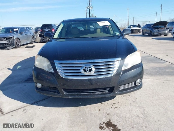 2009 Toyota Avalon XL with VIN 4T1BK36B89U335604, listed as a IAAI auction lot 41328877 with 166,396 mi miles. Bid and sale history available at carsss.com. Image 12.