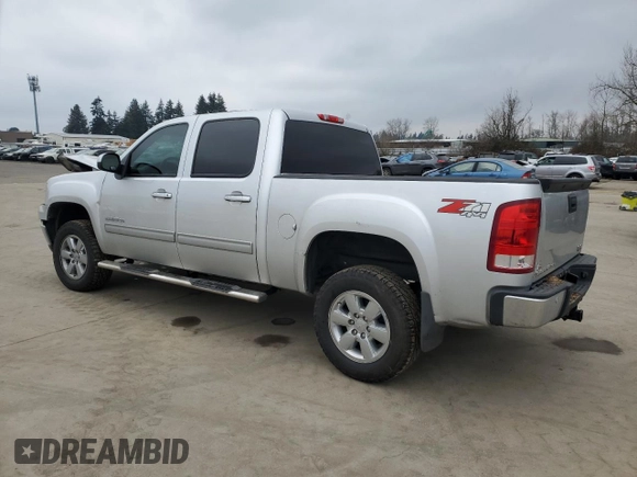 2013 GMC Sierra 1500 SLT with VIN 3GTP2WE75DG275821, listed as a Copart auction lot 43206415 with 141,117 mi miles and Salvage title. Bid and sale history available at DreamBid. Image 2.