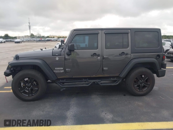 2018 Jeep Wrangler Unlimited Sport S with VIN 1C4BJWDG1JL810754, listed as a IAAI auction lot 42419199 with 74,901 mi miles and . Bid and sale history available at DreamBid. Image 14.