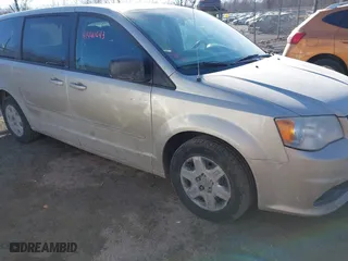 2012 Dodge Grand Caravan SE with VIN 2C4RDGBG0CR419538, listed as a IAAI auction lot 41440643 with 144,678 mi miles. Bid and sale history available at carsss.com. Image 1.