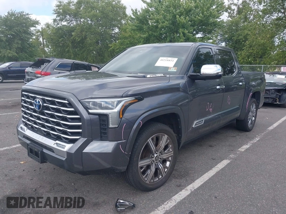 2022 Toyota Tundra Capstone Hybrid with VIN 5TFVC5DB4NX011801, listed as a IAAI auction lot 40218851 with 43,736 mi miles and . Bid and sale history available at DreamBid. Image 2.