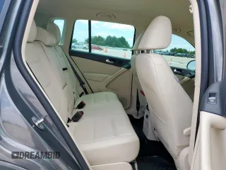 2014 Volkswagen Tiguan SEL с VIN WVGAV3AX7EW506170, выставлен на аукционе Copart как лот 58852355 с пробегом 55 961 миль миль и Списание • Salvage title. История ставок и продаж доступна на DreamBid. Изображение 11.