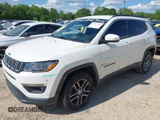 2017 Jeep Compass Latitude with VIN 3C4NJDBB3HT688695, listed as a IAAI auction lot 42197797 with 110,343 mi miles and . Bid and sale history available at DreamBid. Image 2.