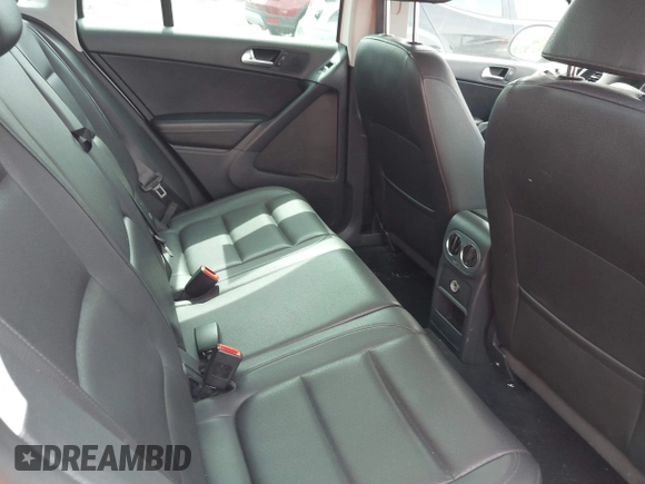 2012 Volkswagen Tiguan SE with VIN WVGAV7AX9CW607960, listed as a IAAI auction lot 42679977 with 106,335 mi miles and . Bid and sale history available at DreamBid. Image 8.