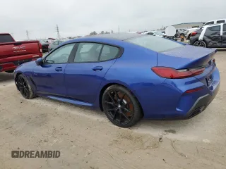 2023 BMW 8 Series 840i with VIN WBAGV2C01PCK32930, listed as a Copart auction lot 82891334 with 0 mi miles and Salvage Title. Bid and sale history available at carsss.com. Image 2.
