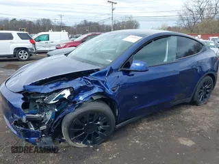 2023 Tesla Model Y Long Range with VIN 7SAYGDEE4PF891709, listed as a IAAI auction lot 41944893 with 15,864 mi miles. Bid and sale history available at carsss.com. Image 19.