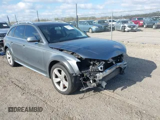2014 Audi allroad A4 Premium Plus z VIN WA1UFAFL8EA133365, wystawiony jako IAAI lot #42034903 z przebiegiem 145 285 mil mil oraz . Historia ofert i sprzedaży dostępna na DreamBid. Obrazek 19.