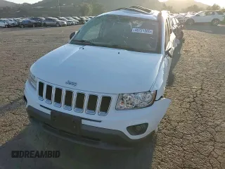 2011 Jeep Compass Latitude with VIN 1J4NT1FB7BD236694, listed as a Copart auction lot 46721365 with 150,897 mi miles and Salvage Title. Bid and sale history available at carsss.com. Image 11.
