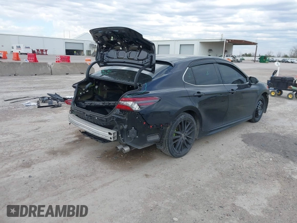 2022 Toyota Camry XSE z VIN 4T1K61AK2NU700840, wystawiony jako IAAI lot #41352884 z przebiegiem 98 634 mil mil oraz . Historia ofert i sprzedaży dostępna na DreamBid. Obrazek 4.