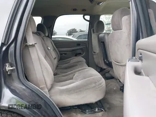 2005 GMC Yukon SLT z VIN 1GKEC13V95J261305, wystawiony jako IAAI lot #42194360 z przebiegiem 193 597 mil mil oraz . Historia ofert i sprzedaży dostępna na DreamBid. Obrazek 8.