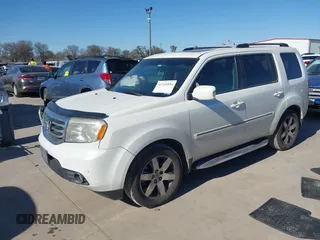 2012 Honda Pilot Touring with VIN 5FNYF3H91CB020673, listed as a IAAI auction lot 41721836 with 123,607 mi miles and . Bid and sale history available at carsss.com. Image 17.