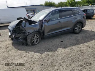 2019 Mazda CX-9 Touring z VIN JM3TCBCY0K0309947, wystawiony jako Copart lot #56897815 z przebiegiem 87 517 mil mil oraz Szkoda całkowita • Salvage title. Historia ofert i sprzedaży dostępna na DreamBid. Obrazek 1.