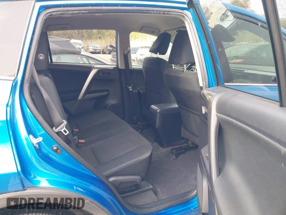 2018 Toyota RAV4 LE with VIN JTMBFREV8JJ220630, listed as a IAAI auction lot 42001795 with 86,027 mi miles. Bid and sale history available at carsss.com. Image 8.