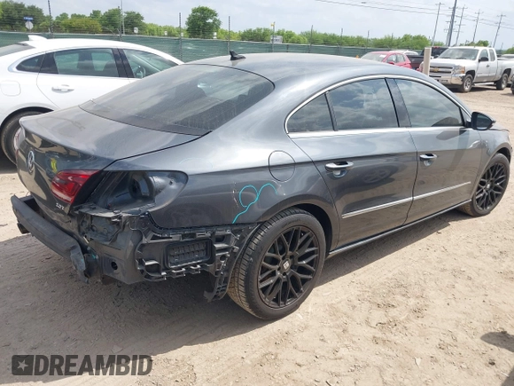 2013 Volkswagen CC Sport with VIN WVWBN7AN2DE518150, listed as a IAAI auction lot 42011967 with 115,127 mi miles and . Bid and sale history available at DreamBid. Image 4.