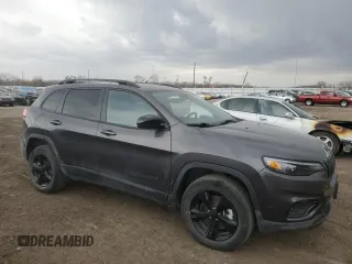 2023 Jeep Cherokee Altitude Lux with VIN 1C4PJMMBXPD101581, listed as a Copart auction lot 49298345 with 28,852 mi miles and Salvage Title. Bid and sale history available at carsss.com. Image 4.