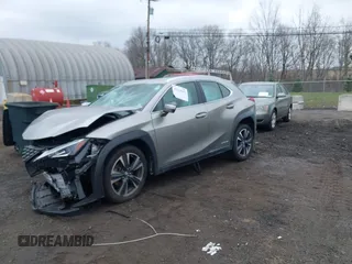 2019 Lexus UX 250h z VIN JTHU9JBH9K2008345, wystawiony jako IAAI lot #42019642 z przebiegiem Nie podano mil oraz . Historia ofert i sprzedaży dostępna na DreamBid. Obrazek 16.