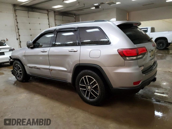 2017 Jeep Grand Cherokee Trailhawk with VIN 1C4RJFLG8HC618709, listed as a Copart auction lot 52899194 with 69,000 mi miles and Salvage title. Bid and sale history available at DreamBid. Image 2.