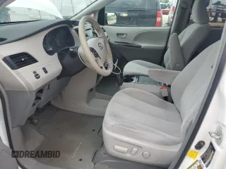 2012 Toyota Sienna LE AAS with VIN 5TDKK3DC2CS217382, listed as a Copart auction lot 58067475 with 146,769 mi miles and Salvage title. Bid and sale history available at DreamBid. Image 7.