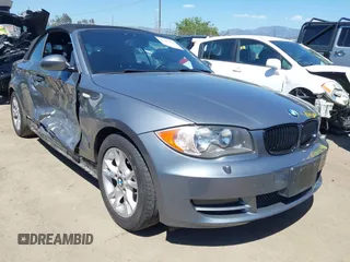 2009 BMW 1 Series 128i with VIN WBAUN13519VH80851, listed as a IAAI auction lot 42196163 with 103,509 mi miles and . Bid and sale history available at DreamBid. Image 1.