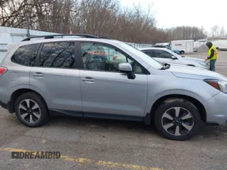 2018 Subaru Forester Premium with VIN JF2SJAEC3JH403764, listed as a IAAI auction lot 41828278 with 84,085 mi miles and . Bid and sale history available at DreamBid. Image 12.