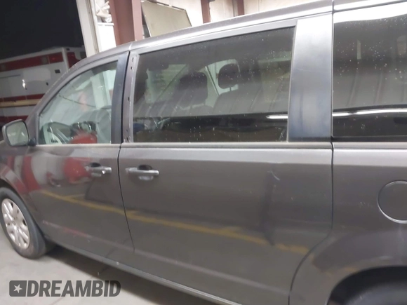 2018 Dodge Grand Caravan SE with VIN 2C4RDGBG8JR230875, listed as a IAAI auction lot 42062774 with 194,781 mi miles and . Bid and sale history available at DreamBid. Image 14.