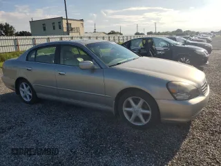 2003 Infiniti Q45 z VIN JNKBF01A93M103010, wystawiony jako Copart lot #74080224 z przebiegiem 46 898 mil mil oraz Szkody całkowita. Historia ofert i sprzedaży dostępna na DreamBid. Obrazek 4.
