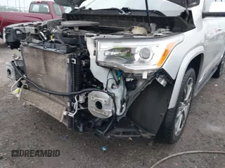 2017 GMC Acadia Denali z VIN 1GKKNXLS8HZ188018, wystawiony jako IAAI lot #42420881 z przebiegiem 150 134 mil mil oraz . Historia ofert i sprzedaży dostępna na DreamBid. Obrazek 6.