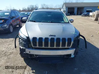 2014 Jeep Cherokee Latitude with VIN 1C4PJMCS7EW310179, listed as a IAAI auction lot 41757831 with 134,087 mi miles and . Bid and sale history available at DreamBid. Image 13.