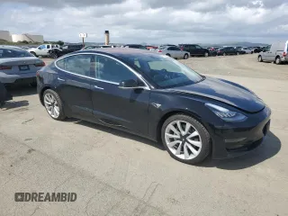 2018 Tesla Model 3 Long Range Battery with VIN 5YJ3E1EB1JF186827, listed as a Copart auction lot 51179535 with 53,649 mi miles and Salvage Title. Bid and sale history available at DreamBid. Image 4.