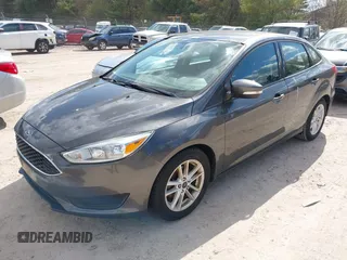 2016 Ford Focus SE with VIN 1FADP3F22GL288268, listed as a IAAI auction lot 42149474 with 78,487 mi miles and . Bid and sale history available at carsss.com. Image 2.