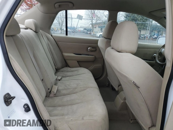2007 Nissan Versa 1.8 SL with VIN 3N1BC11E67L402475, listed as a Copart auction lot 84464734 with 62,399 mi miles and Salvage Title. Bid and sale history available at carsss.com. Image 10.