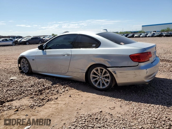 2012 BMW 3 Series 328i with VIN WBAKE5C52CJ106184, listed as a Copart auction lot 62584315 with 134,248 mi miles and Salvage title. Bid and sale history available at DreamBid. Image 2.