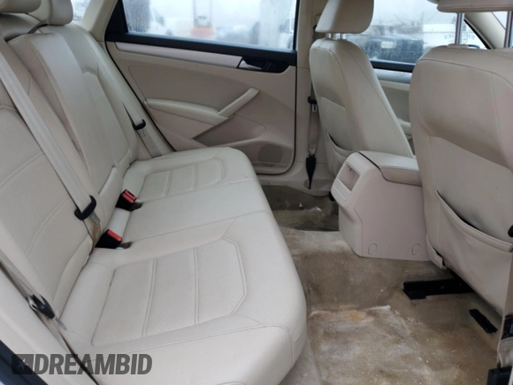 2012 Volkswagen Passat SE z VIN 1VWBH7A37CC030518, wystawiony jako Copart lot #86875014 z przebiegiem 136 259 mil mil oraz Czysty tytuł • Clean title. Historia ofert i sprzedaży dostępna na DreamBid. Obrazek 10.