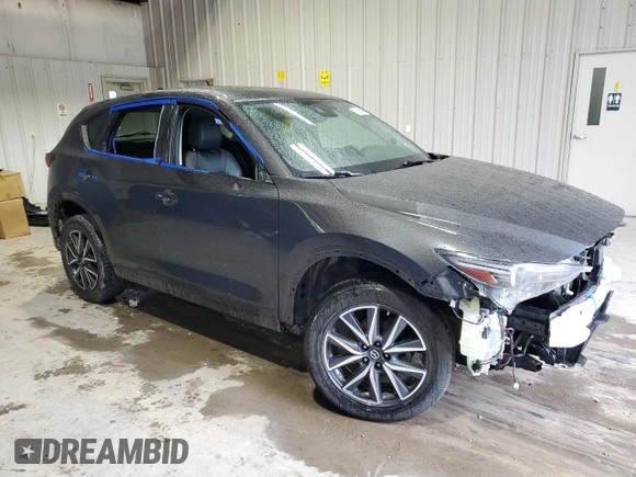 2018 Mazda CX-5 Grand Touring with VIN JM3KFBDM1J0440849, listed as a Copart auction lot 58354655 with 43,348 mi miles and Salvage title. Bid and sale history available at DreamBid. Image 4.